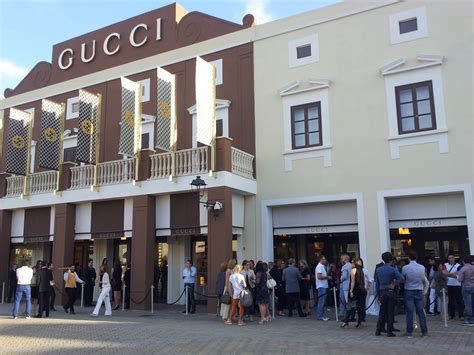 italy gucci outlet store|gucci outlet online store.